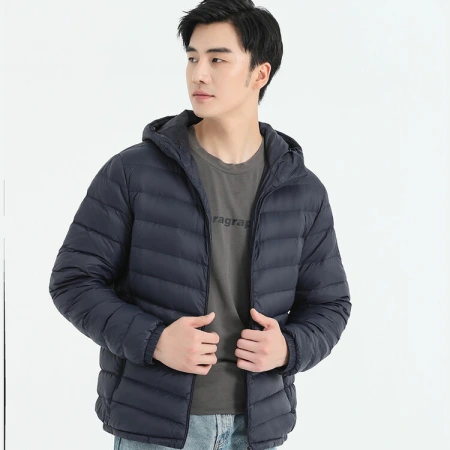The men's down jacket is light, warm, simple and versatile. It's a new hooded winter coat. It's a light and casual men's dad outfit The men's down jacket is light, warm, simple and versatile. It's a new hooded winter coat. It's a light and casual men's dad outfit